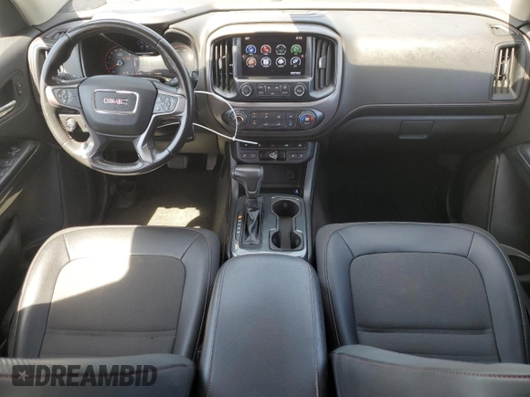 2016 GMC Canyon 4WD SLE with VIN 1GTG6CE34G1317723, listed as a Copart auction lot 68897634 with 61,975 mi miles and Salvage Title. Bid and sale history available at carsss.com. Image 8.