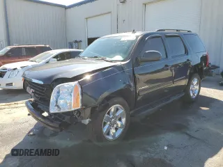 2011 GMC Yukon SLE with VIN 1GKS1AE02BR213992, listed as a Copart auction lot 75609704 with 133,536 mi miles and Salvage Title. Bid and sale history available at carsss.com. Image 1.