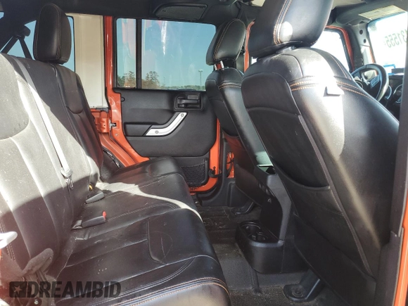 2015 Jeep Wrangler Unlimited Rubicon Hard Rock z VIN 1C4HJWFG7FL690098, wystawiony jako Copart lot #47431555 z przebiegiem 95 138 mil mil oraz Szkoda całkowita • Salvage title. Historia ofert i sprzedaży dostępna na DreamBid. Obrazek 11.