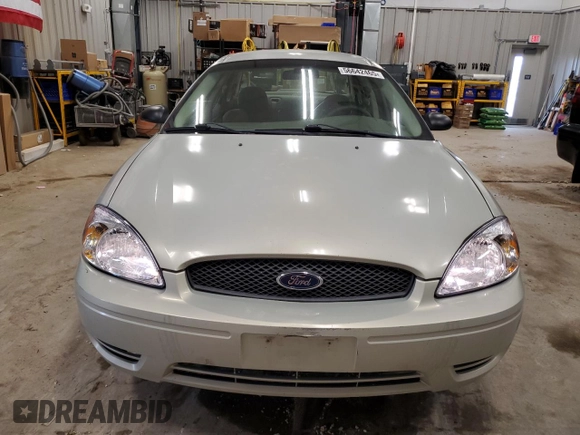 2007 Ford Taurus SE with VIN 1FAFP53U17A150484, listed as a Copart auction lot 56642465 with Not provided miles and Clean title. Bid and sale history available at DreamBid. Image 5.