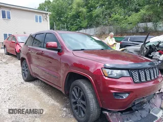 2017 Jeep Grand Cherokee Altitude with VIN 1C4RJFAG0HC700419, listed as a IAAI auction lot 42553449 with 143,872 mi miles and . Bid and sale history available at DreamBid. Image 1.