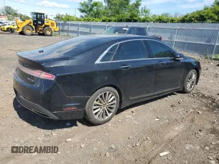 2017 Lincoln MKZ Select z VIN 3LN6L5D97HR601971, wystawiony jako Copart lot #57715655 z przebiegiem 130 071 mil mil oraz Czysty tytuł • Clean title. Historia ofert i sprzedaży dostępna na DreamBid. Obrazek 3.