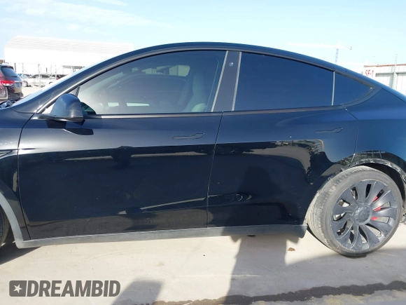 2022 Tesla Model Y Performance with VIN 7SAYGDEF6NF532027, listed as a IAAI auction lot 41717662 with 36,537 mi miles and . Bid and sale history available at DreamBid. Image 15.