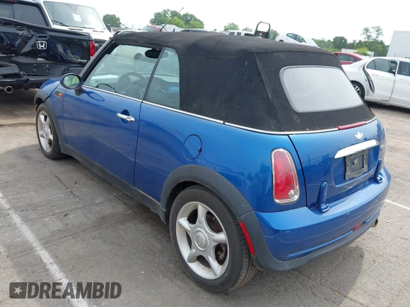 2006 MINI Convertible with VIN WMWRF33566TF65679, listed as a IAAI auction lot 42288864 with 119,884 mi miles and . Bid and sale history available at DreamBid. Image 3.