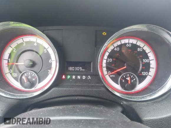2012 Dodge Grand Caravan SXT with VIN 2C4RDGCG4CR304472, listed as a IAAI auction lot 41396437 with 180,309 mi miles and . Bid and sale history available at DreamBid. Image 7.