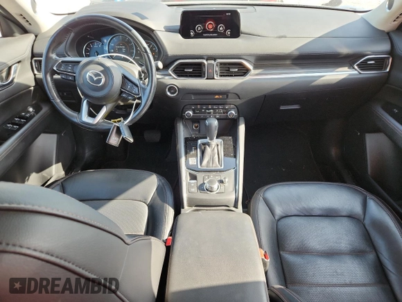 2020 Mazda CX-5 Grand Touring z VIN JM3KFADM2L0803589, wystawiony jako Copart lot #61916825 z przebiegiem 63 663 mil mil oraz Szkoda całkowita • Salvage title. Historia ofert i sprzedaży dostępna na DreamBid. Obrazek 8.
