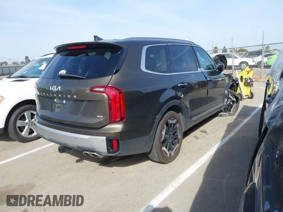 2023 Kia Telluride S with VIN 5XYP6DGC0PG334800, listed as a IAAI auction lot 42078611 with 27,486 mi miles and . Bid and sale history available at DreamBid. Image 4.