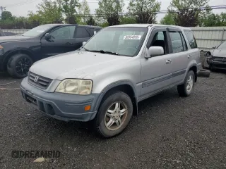 2001 Honda CR-V EX z VIN JHLRD18661C023330, wystawiony jako Copart lot #56954895 z przebiegiem 181 359 mil mil oraz Szkoda całkowita • Salvage title. Historia ofert i sprzedaży dostępna na DreamBid. Obrazek 1.