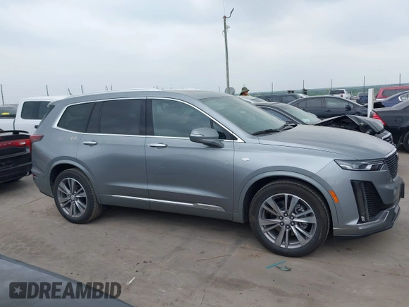 2025 Cadillac XT6 FWD Premium Luxury with VIN 1GYKPCRS4SZ119978, listed as a IAAI auction lot 41877109 with 13,579 mi miles. Bid and sale history available at carsss.com. Image 13.