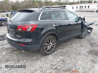 2015 Mazda CX-9 Grand Touring with VIN JM3TB3DV8F0462823, listed as a IAAI auction lot 41863462 with 91,043 mi miles. Bid and sale history available at carsss.com. Image 4.