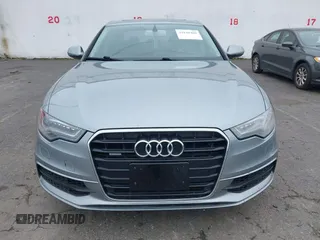 2013 Audi A6 Prestige z VIN WAUHGAFC2DN009441, wystawiony jako IAAI lot #41848400 z przebiegiem 147 198 mil mil oraz . Historia ofert i sprzedaży dostępna na DreamBid. Obrazek 6.