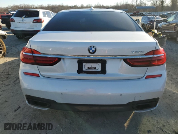 2017 BMW 7 Series 750i with VIN WBA7F0C51HGM21052, listed as a Copart auction lot 46299535 with 85,765 mi miles and Clean title. Bid and sale history available at DreamBid. Image 6.