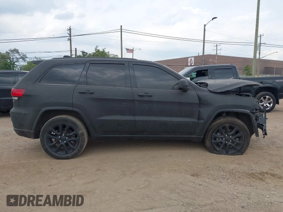 2020 Jeep Grand Cherokee Laredo E with VIN 1C4RJFAG2LC326761, listed as a IAAI auction lot 42434904 with 88,556 mi miles and . Bid and sale history available at DreamBid. Image 13.
