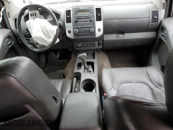 2012 Nissan Frontier Pro-4X z VIN 1N6AD0EV8CC454476, wystawiony jako Copart lot #53110155 z przebiegiem Nie podano mil oraz Szkoda całkowita • Salvage title. Historia ofert i sprzedaży dostępna na DreamBid. Obrazek 8.