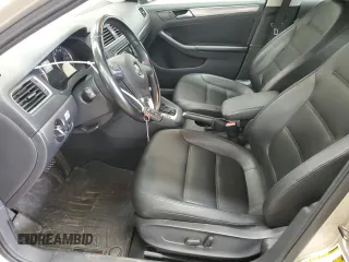 2014 Volkswagen Jetta TDI w/Premium with VIN 3VWLL7AJ9EM261908, listed as a Copart auction lot 60703205 with 128,892 mi miles and Salvage title. Bid and sale history available at DreamBid. Image 7.