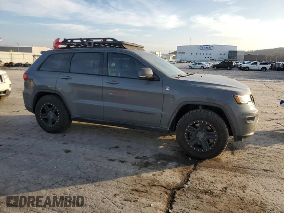 2020 Jeep Grand Cherokee Trailhawk with VIN 1C4RJFLT9LC430514, listed as a Copart auction lot 85311924 with 170,554 mi miles and Salvage title. Bid and sale history available at DreamBid. Image 4.