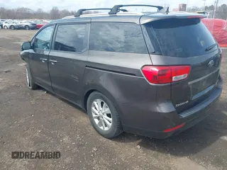 2016 Kia Sedona LX with VIN KNDMB5C11G6158934, listed as a IAAI auction lot 41908323 with 105,888 mi miles and . Bid and sale history available at carsss.com. Image 3.
