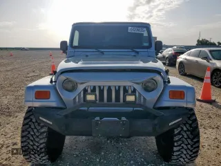 2005 Jeep Wrangler X с VIN 1J4FA39S45P353119, выставлен на аукционе Copart как лот 64206825 с пробегом 134 298 миль миль и Списание • Salvage title. История ставок и продаж доступна на DreamBid. Изображение 5.