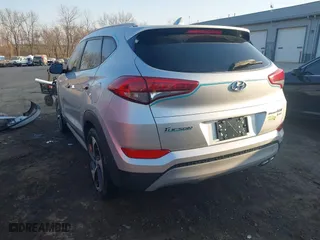 2018 Hyundai Tucson Value with VIN KM8J3CA23JU651464, listed as a IAAI auction lot 41757165 with 72,339 mi miles. Bid and sale history available at carsss.com. Image 3.