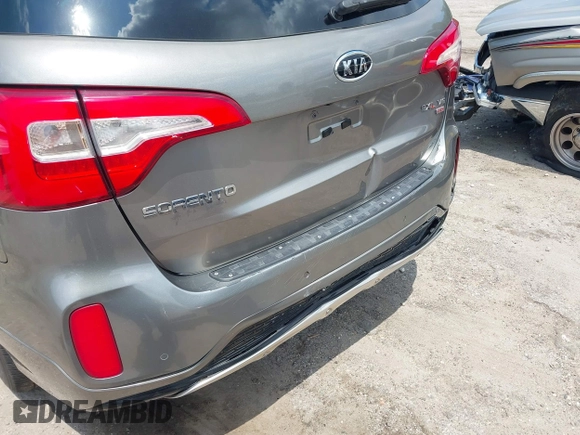 2014 Kia Sorento SX z VIN 5XYKWDA75EG461948, wystawiony jako IAAI lot #42180084 z przebiegiem 123 917 mil mil oraz . Historia ofert i sprzedaży dostępna na DreamBid. Obrazek 20.