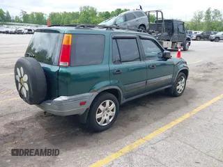2001 Honda CR-V LX z VIN JHLRD18401C000348, wystawiony jako IAAI lot #42377422 z przebiegiem 238 192 mil mil oraz . Historia ofert i sprzedaży dostępna na DreamBid. Obrazek 4.