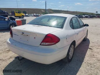 2006 Ford Taurus SE with VIN 1FAHP532X6A257510, listed as a IAAI auction lot 41892422 with 130,633 mi miles. Bid and sale history available at carsss.com. Image 4.