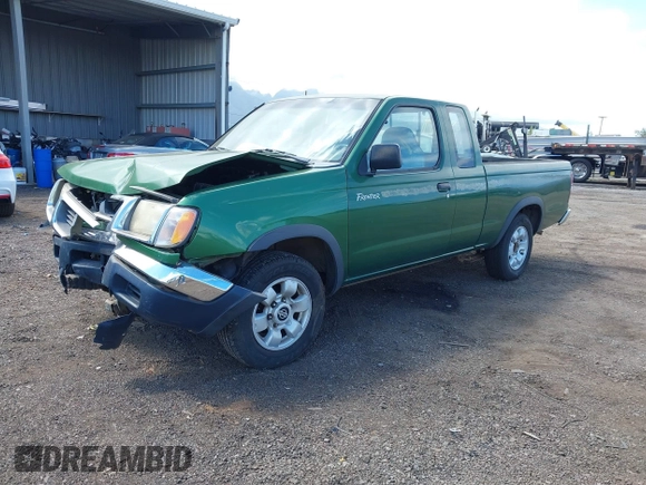 1998 Nissan Frontier XE with VIN 1N6DD26S9WC308153, listed as a IAAI auction lot 41690052 with 122,693 mi miles and . Bid and sale history available at DreamBid. Image 2.