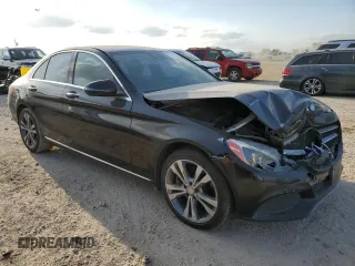 2017 Mercedes-Benz C 300 with VIN WDDWF4KB5HR232055, listed as a Copart auction lot 52674055 with 124,598 mi miles and Salvage Title. Bid and sale history available at DreamBid. Image 4.