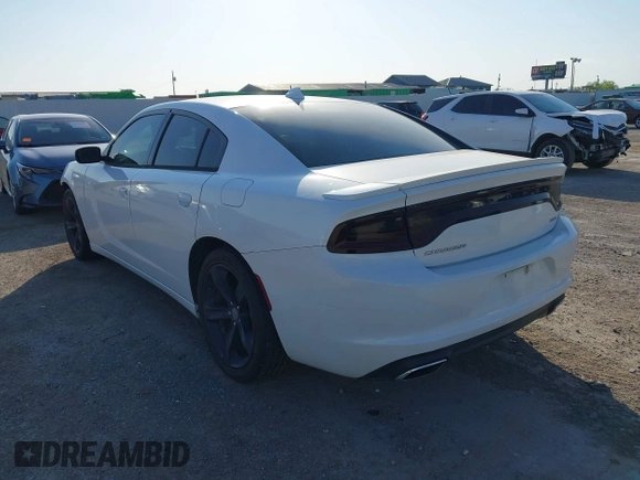 2015 Dodge Charger SXT with VIN 2C3CDXHG8FH730145, listed as a IAAI auction lot 42039927 with 156,135 mi miles and . Bid and sale history available at DreamBid. Image 3.
