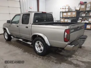 2000 Nissan Frontier XE z VIN 1N6ED27T8YC314914, wystawiony jako IAAI lot #42396047 z przebiegiem 182 486 mil mil oraz . Historia ofert i sprzedaży dostępna na DreamBid. Obrazek 3.