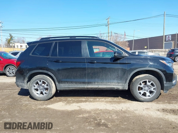 2023 Honda Passport TrailSport with VIN 5FNYF8H67PB042153, listed as a IAAI auction lot 41757909 with 26,810 mi miles and . Bid and sale history available at DreamBid. Image 13.