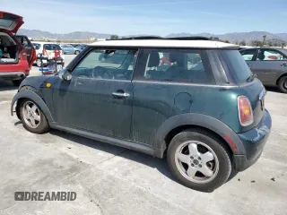 2008 MINI Hardtop with VIN WMWMF33578TT62441, listed as a Copart auction lot 48410155 with 116,894 mi miles and Salvage title. Bid and sale history available at DreamBid. Image 2.