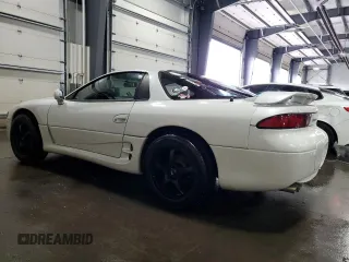 1996 Mitsubishi 3000GT GT z VIN JA3AM84J5TY002387, wystawiony jako Copart lot #64983534 z przebiegiem 149 380 mil mil oraz Szkody całkowita. Historia ofert i sprzedaży dostępna na DreamBid. Obrazek 2.