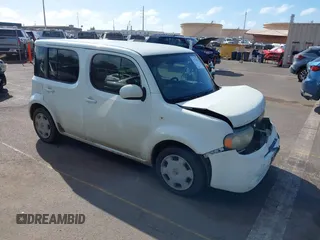 2011 Nissan Cube S z VIN JN8AZ2KR1BT213210, wystawiony jako IAAI lot #41776566 z przebiegiem 160 649 mil mil oraz . Historia ofert i sprzedaży dostępna na DreamBid. Obrazek 1.