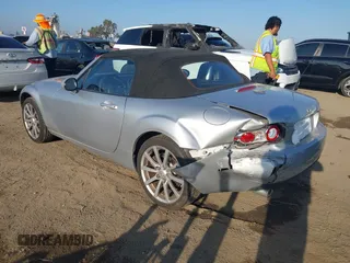 2007 Mazda MX-5 Miata Sport z VIN JM1NC25F170132331, wystawiony jako IAAI lot #42381724 z przebiegiem 74 954 mil mil oraz . Historia ofert i sprzedaży dostępna na DreamBid. Obrazek 3.