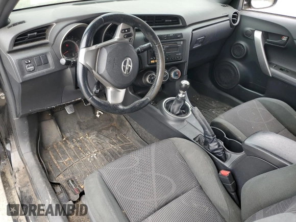 2012 Scion tC z VIN JTKJF5C75C3036478, wystawiony jako Copart lot #53190045 z przebiegiem 140 592 mil mil oraz Czysty tytuł • Clean title. Historia ofert i sprzedaży dostępna na DreamBid. Obrazek 8.