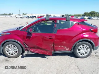 2019 Toyota C-HR XLE with VIN JTNKHMBX5K1044846, listed as a IAAI auction lot 41670614 with 52,374 mi miles. Bid and sale history available at carsss.com. Image 6.