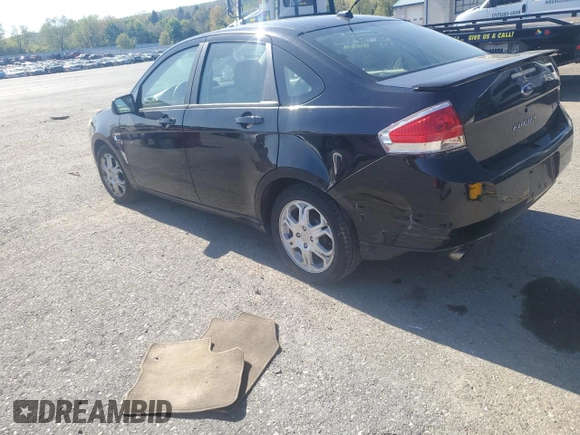 2008 Ford Focus SE with VIN 1FAHP35N38W288938, listed as a Copart auction lot 54847375 with 205,580 mi miles and Salvage Title. Bid and sale history available at DreamBid. Image 2.