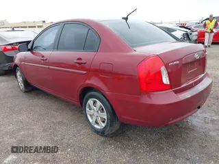 2011 Hyundai Accent GLS with VIN KMHCN4AC8BU597226, listed as a IAAI auction lot 41963682 with 166,020 mi miles and . Bid and sale history available at DreamBid. Image 3.