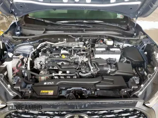 2023 Toyota Corolla Cross LE with VIN 7MUBAAAG4PV042580, listed as a Copart auction lot 63797305 with 59,576 mi miles and Salvage title. Bid and sale history available at DreamBid. Image 12.