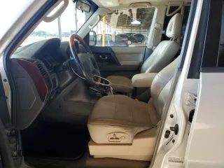 2006 Mitsubishi Montero Limited z VIN JA4MW51SX6J003398, wystawiony jako Copart lot #70511684 z przebiegiem 167 981 mil mil oraz Tytuł czysty. Historia ofert i sprzedaży dostępna na DreamBid. Obrazek 7.