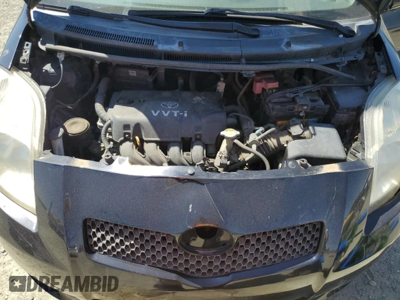 2008 Toyota Yaris with VIN JTDJT923785177098, listed as a Copart auction lot 56070785 with 138,152 mi miles and Salvage Title. Bid and sale history available at DreamBid. Image 11.