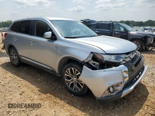 2016 Mitsubishi Outlander SE with VIN JA4AD3A36GZ013709, listed as a Copart auction lot 60262595 with 156,109 mi miles and Salvage title. Bid and sale history available at DreamBid. Image 4.
