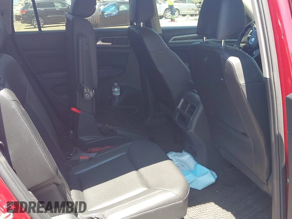 2019 Volkswagen Atlas SE with VIN 1V2UR2CA4KC553905, listed as a IAAI auction lot 42401734 with 71,405 mi miles and . Bid and sale history available at DreamBid. Image 8.