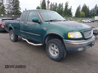 1999 Ford F-150 with VIN 2FTRX18W1XCA74886, listed as a IAAI auction lot 42260784 with 193,425 mi miles and . Bid and sale history available at DreamBid. Image 1.