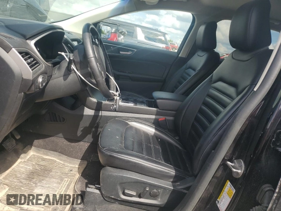 2020 Ford Edge SEL z VIN 2FMPK4J95LBB04706, wystawiony jako Copart lot #56948215 z przebiegiem 69 376 mil mil oraz Czysty tytuł • Clean title. Historia ofert i sprzedaży dostępna na DreamBid. Obrazek 7.