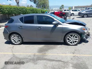2015 Lexus CT 200h with VIN JTHKD5BH9F2215210, listed as a IAAI auction lot 42266502 with 229,754 mi miles and . Bid and sale history available at DreamBid. Image 14.