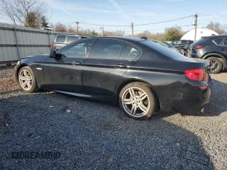 2013 BMW 5 Series 535i xDrive with VIN WBAFU7C54DDU74933, listed as a Copart auction lot 50698855 with 156,112 mi miles and Salvage Title. Bid and sale history available at DreamBid. Image 2.