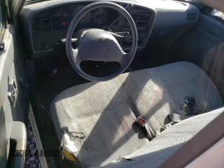 1994 Toyota Pickup DX z VIN JT4RN81P0R5200010, wystawiony jako Copart lot #89184805 z przebiegiem 123 270 mil mil oraz Szkoda całkowita • Salvage title. Historia ofert i sprzedaży dostępna na DreamBid. Obrazek 8.
