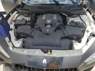 2017 Maserati Ghibli z VIN ZAM57XSL0H1203506, wystawiony jako Copart lot #56698805 z przebiegiem 67 714 mil mil oraz Tytuł czysty. Historia ofert i sprzedaży dostępna na DreamBid. Obrazek 11.